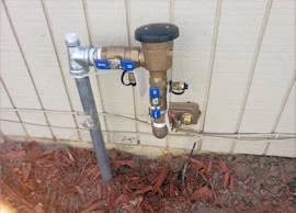 backflow and wall hydrant installation